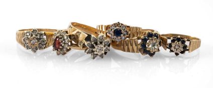 SIX GOLD RINGS comprising six similar cluster rings set with diamonds, sapphires and cubic