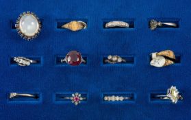 ASSORTED DRESS RINGS comprising rolled gold, silver set, steel cut, believed moonstone and