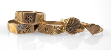 FIVE 9CT GOLD RINGS comprising three set with diamond chips, one similar and a heart shaped ring,
