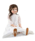BRUNO SCHMIDT BISQUE HEAD CHARACTER TODDLER DOLL, German c.1910, probably a '1692', with blue