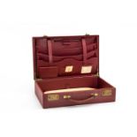 THREE VINTAGE LEATHER CASES, comprising stylish Edwardian scarlet morocco leather writing case