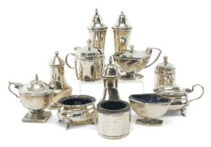 FOUR SILVER 3PC. CRUETS, including mustard pots, salt and pepper casters, various dates (12)