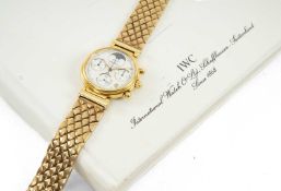 IWC LADY'S 18K GOLD DA VINCI CHRONOGRAPH WRISTWATCH, the white dial with four subsidiary dials
