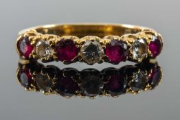 18CT GOLD SEVEN STONE DIAMOND & RUBY RING, ring size N 1/2, 3.1gms in vintage T. & D. G Lloyd of