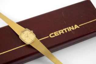 CERTINA 'Q' 18CT GOLD LADY'S WRISTWATCH having diamond border, integrated tapering 18ct gold