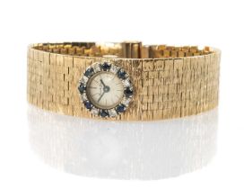 9CT GOLD BEUCHE-GIROD LADIES' WRISTWATCH, the small circular dial having sapphire and diamond
