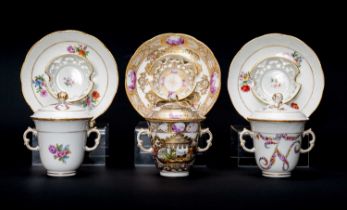 THREE BERLIN PORCELAIN CHOCOLATE CUPS, COVERS & STANDS, 19th Century, moulded basketweave borders,