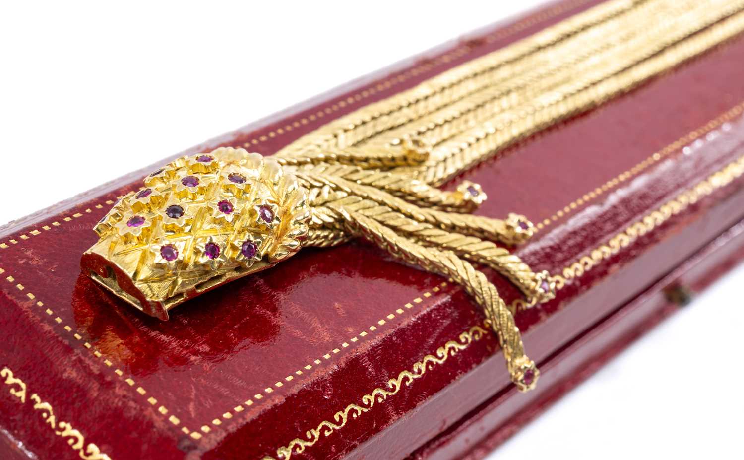 18CT GOLD SIX STRAND BRACELET, designed with pineapple terminal set with rubies, 19.5cms long, 66. - Image 3 of 3