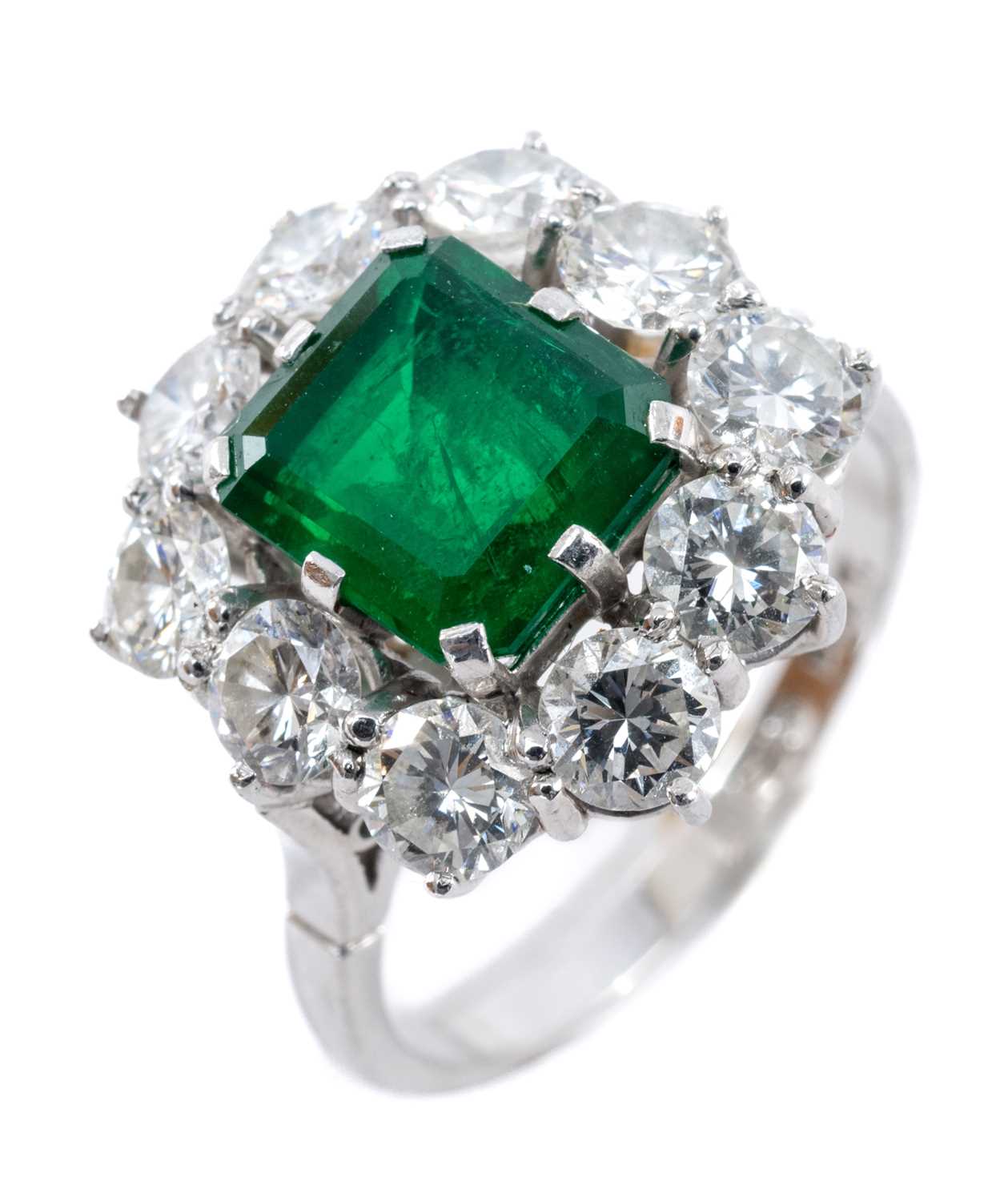 PLATINUM EMERALD & DIAMOND CLUSTER RING, the central emerald (7 x 8mms approx.) measuring 2.2cts - Image 2 of 2