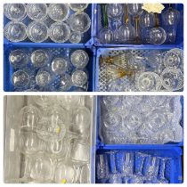 LARGE COLLECTION OF CUT GLASSWARE including champagne flutes, sundae dishes and brandy balloons,