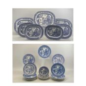 BLUE & WHITE WILLOW PATTERN DRESSER SET, 26 PIECES, including 3 x 45cms across meat platters, 4 x