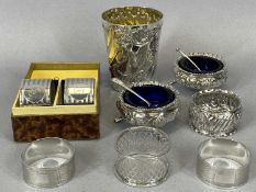 ELEVEN ITEMS OF SMALL SILVER, including pair of embossed circular salts on hoof feet with blue glass