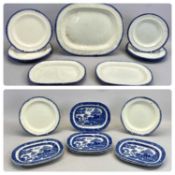 SEVEN VICTORIAN BLUE & WHITE WILLOW PATTERN TRANSFER DECORATED OVAL PLATES, 18 x 25cms, and