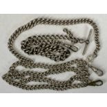 THREE VINTAGE SILVER CURB LINK ALBERTS comprising a short example with graduating lengths and spring