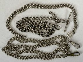 THREE VINTAGE SILVER CURB LINK ALBERTS comprising a short example with graduating lengths and spring