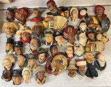 VAST COLLECTION OF BOSSONS WALL PLAQUES / WALL MASKS, various figures including Dickens characters