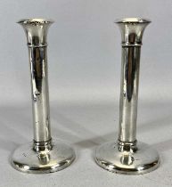 PAIR OF EARLY 20TH CENTURY LOADED SILVER CANDLESTICKS, Birmingham hallmarks, maker William