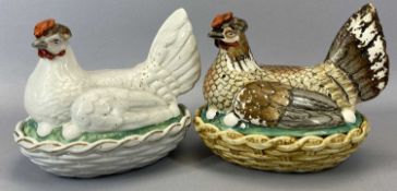 TWO STAFFORDSHIRE POTTERY HEN-ON-NESTS, one having colourful detail, the other white, 18cms H, 22cms