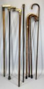 EIGHT VARIOUS VINTAGE WALKING STICKS & CANES, natural woods including one Malacca with carved bone