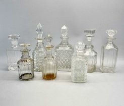 FOUR CIRCULAR CUT GLASS DECANTERS, 31cms H, and 4 x others Provenance: deceased estate Gwynedd