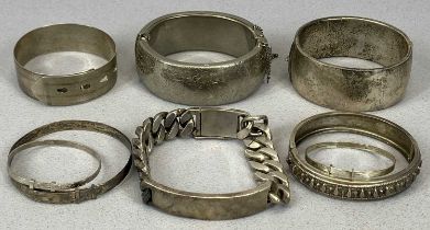 SILVER & WHITE METAL BANGLES & BRACELETS group of eight, comprising belt-style bangle with engine