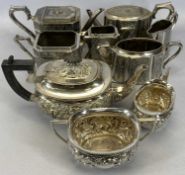 THREE VICTORIAN & LATER THREE-PIECE TEASETS IN EPBM AND EPNS, comprising a square form set with