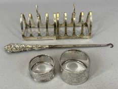 FIVE ITEMS OF SMALL SILVER, comprising a pair of toast racks, Sheffield 1932, maker Emile Viner,