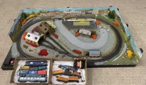 HORNBY MODEL RAILWAY LAYOUT WITH PANORAMIC STREET & MOUNTAIN VIEW BACKBOARDS, buildings, animals and