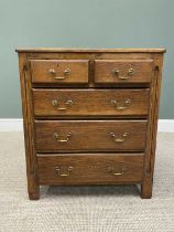 REPRODUCTION OAK CHEST OF TWO SHORT OVER THREE LONG DRAWERS with circular brass pommels and swan