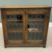 OAK TWO-DOOR PRIORY STYLE BOOKCASE, carved frieze with leaded glass and interior shelves, on stile