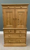 REPRODUCTION PINE TALLBOY with twin upper drawers over two opening panelled doors and a lower