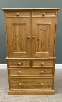 REPRODUCTION PINE TALLBOY with twin upper drawers over two opening panelled doors and a lower