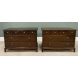 TWO STAG MINSTREL CHESTS OF FOUR SMALL OVER TWO LONG DRAWERS, having turned brass knobs and ring