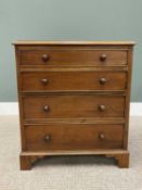 NEATLY PROPORTIONED VINTAGE MAHOGANY CHEST OF FOUR LONG DRAWERS with turned wooden knobs and