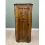 REPRODUCTION OAK CORNER HALL ROBE, single door with carved upper panel and frieze details, fancy