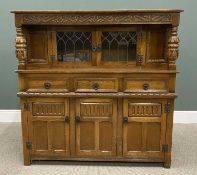 REPRODUCTION OAK CARVED BUFFET SIDEBOARD, having leaded glass upper doors below a carved front
