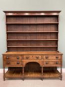 GEORGE IV SOUTH WALES OAK POT BOARD DRESSER, wide boarded back and shaped sided graduating four