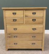 ULTRA MODERN OAK CHEST OF FOUR SHORT OVER THREE LONG DRAWERS, with campaign-style inset pull handles