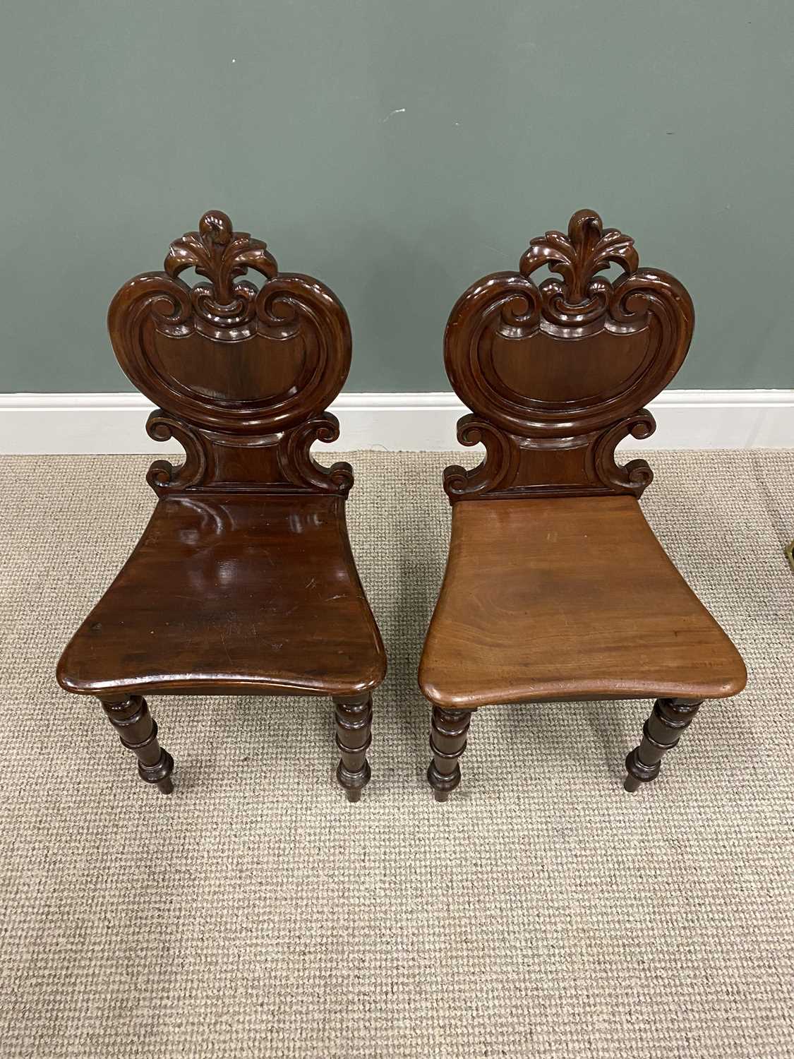 VERY NEAR PAIR OF VICTORIAN MAHOGANY HALL CHAIRS, having carved leaf crest and scrolled shield panel - Image 2 of 3