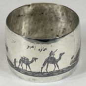 NIELLO TYPE DECORATED MIDDLE EASTERN WHITE METAL NAPKIN RING, probably Iraq, typically decorated