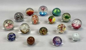 SIXTEEN COLOURFUL GLASS NOVELTY PAPERWEIGHTS, 9cms H (the largest) Provenance: private collection