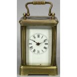 EARLY 20TH CENTURY MINIATURE CARRIAGE CLOCK, single train within a brass case with bevelled glass