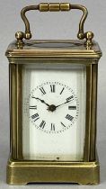 EARLY 20TH CENTURY MINIATURE CARRIAGE CLOCK, single train within a brass case with bevelled glass