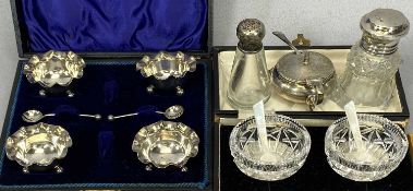 HALLMARKED SILVER & OTHER TABLE CONDIMENTS comprising a cased set of four fluted edge salts on