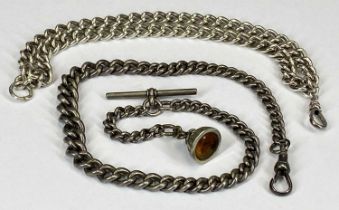 TWO SILVER CURBLINK ALBERT CHAINS, PROBABLY 19TH CENTURY, one with fob containing a yellow stone