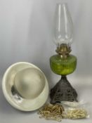 VICTORIAN OIL LAMP WITH PIERCED CAST IRON BASE, green glass reservoir, 28cms H (excl. funnel), and a