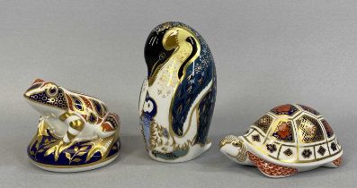 THREE ROYAL CROWN DERBY LARGE PAPERWEIGHTS, King penguin and seated frog, both with gold stoppers,