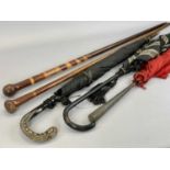 TWO MIXED WOOD WALKING CANES & THREE VINTAGE BROLLIES, one with white metal handle, having all