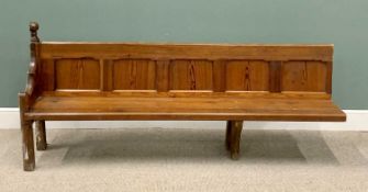 VINTAGE PITCH PINE CHURCH PEW, shaped single end and an open end with five-panel back, 93cms max. H,