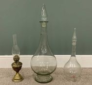 APOTHECARY GLASS DISPLAY CARBOYS x 2 & VINTAGE BRASS OIL LAMP, both carboys with original